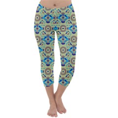 A Blue And Green Pattern On A Green Background Capri Winter Leggings 