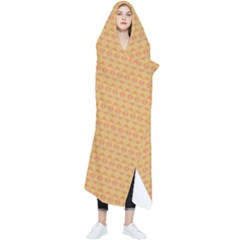 An Orange And Yellow Background With A Pattern Wearable Blanket