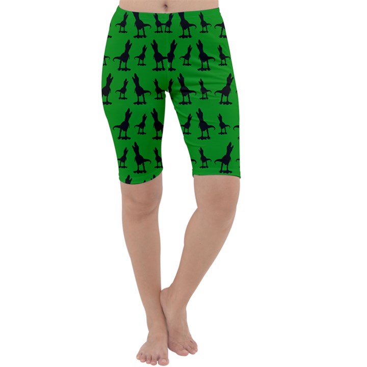 Dinos on a green background Cropped Leggings 