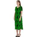 Dinos on a green background T-Shirt Midi Dress With Pockets View2