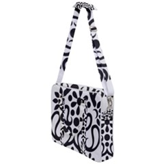 A Black And White Image Of An Ornate Design Cross Body Office Bag