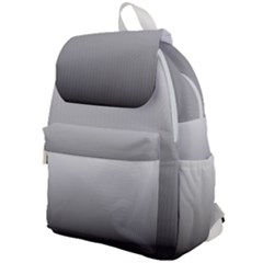 A Black And White Photo Of A Wall Top Flap Backpack