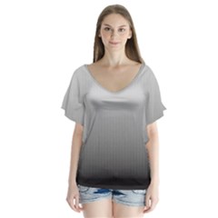 A Black And White Photo Of A Wall V-neck Flutter Sleeve Top