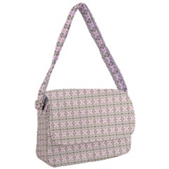 A Pink And Brown Pattern On A White Background Courier Bag