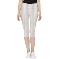 A White Background With A Brown Pattern On It Inside Out Lightweight Velour Capri Leggings 