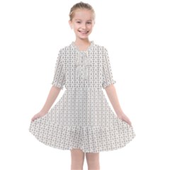 A White Background With A Brown Pattern On It Kids  All Frills Chiffon Dress