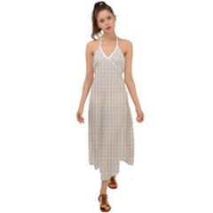 A White Background With A Brown Pattern On It Halter Tie Back Dress 