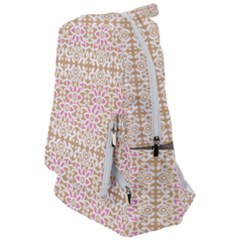 A Pink And White Flower Pattern On A Brown Background Travelers  Backpack