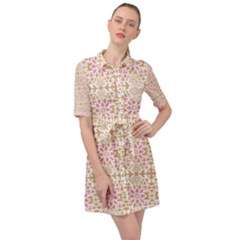 A Pink And White Flower Pattern On A Brown Background Belted Shirt Dress