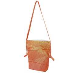 Abstract Texture Of Colorful Bright Pattern Of Transparent Leaves Of Orange And Yellow Color Folding Shoulder Bag