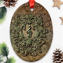 Elegant Clef With Floral Elements On A Background With Damasks Ornament (oval)  by FantasyWorld7