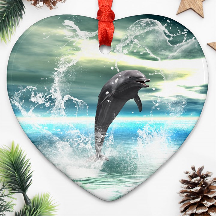 Funny Dolphin Jumping By A Heart Made Of Water Ornament (Heart) 