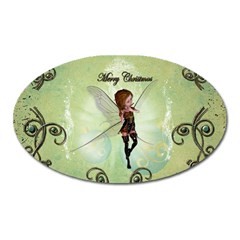 Cute Elf Playing For Christmas Oval Magnet