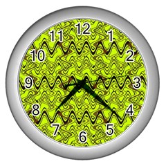 Yellow Wavey Squiggles Wall Clocks (silver)  by BrightVibesDesign