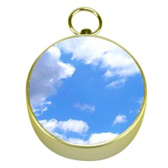 Clouds And Blue Sky Gold Compasses by picsaspassion