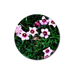 Pink Flowers Over A Green Grass Rubber Round Coaster (4 Pack)  by DanaeStudio