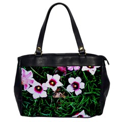 Pink Flowers Over A Green Grass Office Handbags by DanaeStudio