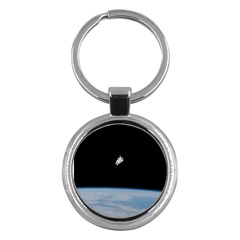 Astronaut Floating Above The Blue Planet Key Chains (round)  by Nexatart