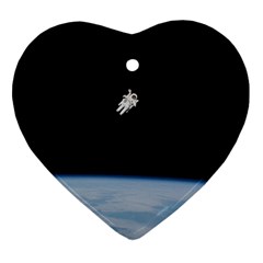 Astronaut Floating Above The Blue Planet Heart Ornament (two Sides) by Nexatart