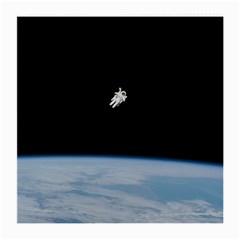 Astronaut Floating Above The Blue Planet Medium Glasses Cloth (2-side) by Nexatart