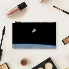 Astronaut Floating Above The Blue Planet Cosmetic Bag (small)  by Nexatart