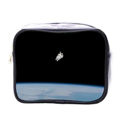 Astronaut Floating Above The Blue Planet Mini Toiletries Bags by Nexatart