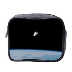 Astronaut Floating Above The Blue Planet Mini Toiletries Bag 2-side by Nexatart