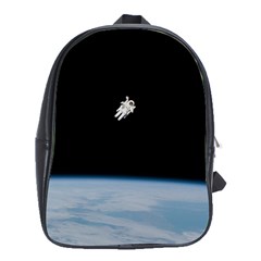 Astronaut Floating Above The Blue Planet School Bags (xl)  by Nexatart