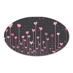 Pink Hearts On Black Background Oval Magnet