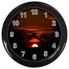 Sunset Sun Fireball Setting Sun Wall Clocks (black) by Simbadda