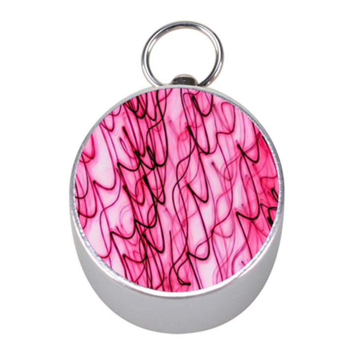 An Unusual Background Photo Of Black Swirls On Pink And Magenta Mini Silver Compasses