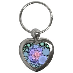 An Abstract Background Consisting Of Pastel Colored Circle Key Chains (heart)  by Simbadda