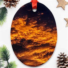 Abstract Orange Black Sunset Clouds Oval Ornament (two Sides) by Simbadda