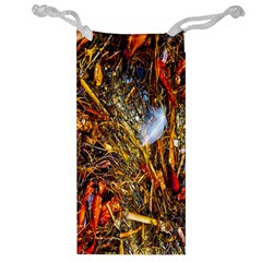 Abstract In Orange Sealife Background Abstract Of Ocean Beach Seaweed And Sand With A White Feather Jewelry Bag by Nexatart