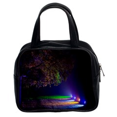 Illuminated Trees At Night Classic Handbags (2 Sides) by Nexatart