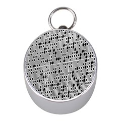 Metal Background With Round Holes Mini Silver Compasses by Nexatart