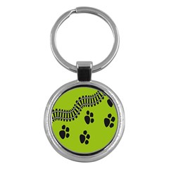 Green Prints Next To Track Key Chains (round)  by Nexatart