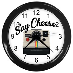 Say Cheese Wall Clocks (black) by Valentinaart