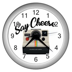 Say Cheese Wall Clocks (silver)  by Valentinaart