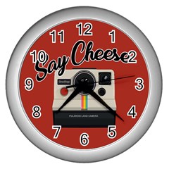 Say Cheese Wall Clocks (silver)  by Valentinaart