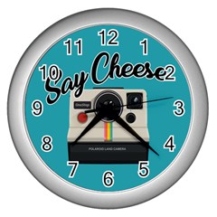 Say Cheese Wall Clocks (silver)  by Valentinaart