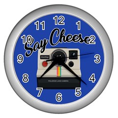 Say Cheese Wall Clocks (silver)  by Valentinaart