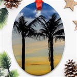 Palm Trees Against Sunset Sky Oval Ornament (Two Sides) Front