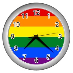 Pride Rainbow Flag Wall Clocks (silver)  by Valentinaart