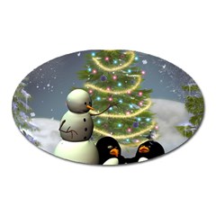 Funny Snowman With Penguin And Christmas Tree Oval Magnet by FantasyWorld7