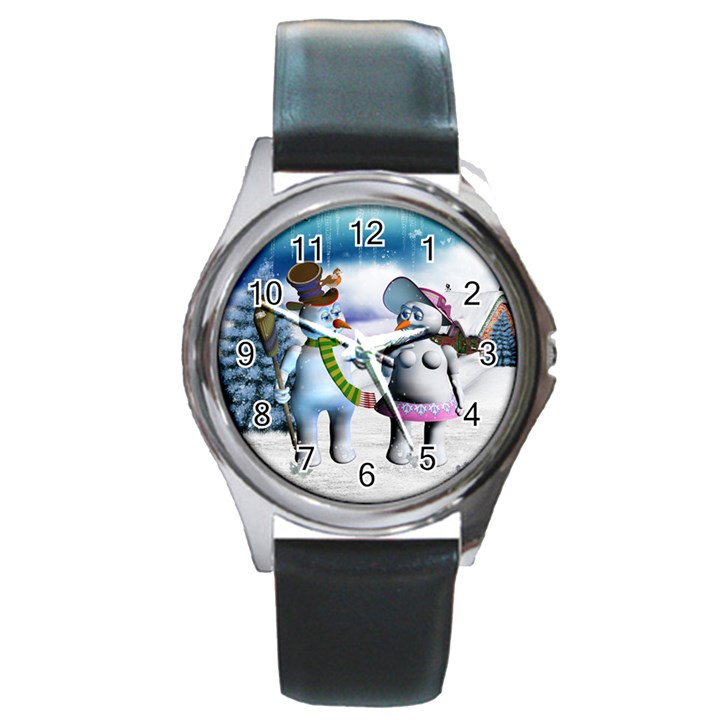 Funny, Cute Snowman And Snow Women In A Winter Landscape Round Metal Watch