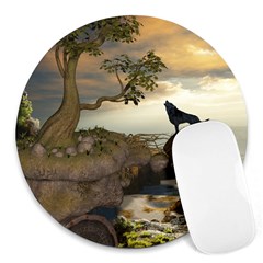 The Lonely Wolf On The Flying Rock Round Mousepads by FantasyWorld7