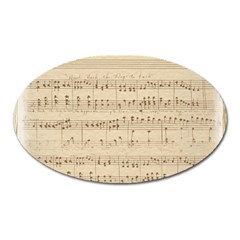 Vintage Beige Music Notes Oval Magnet by Celenk