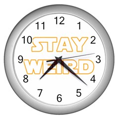 Stay Weird Wall Clocks (silver)  by Valentinaart