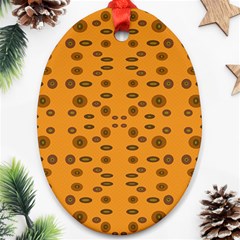 Brown Circle Pattern On Yellow Ornament (oval) by BrightVibesDesign